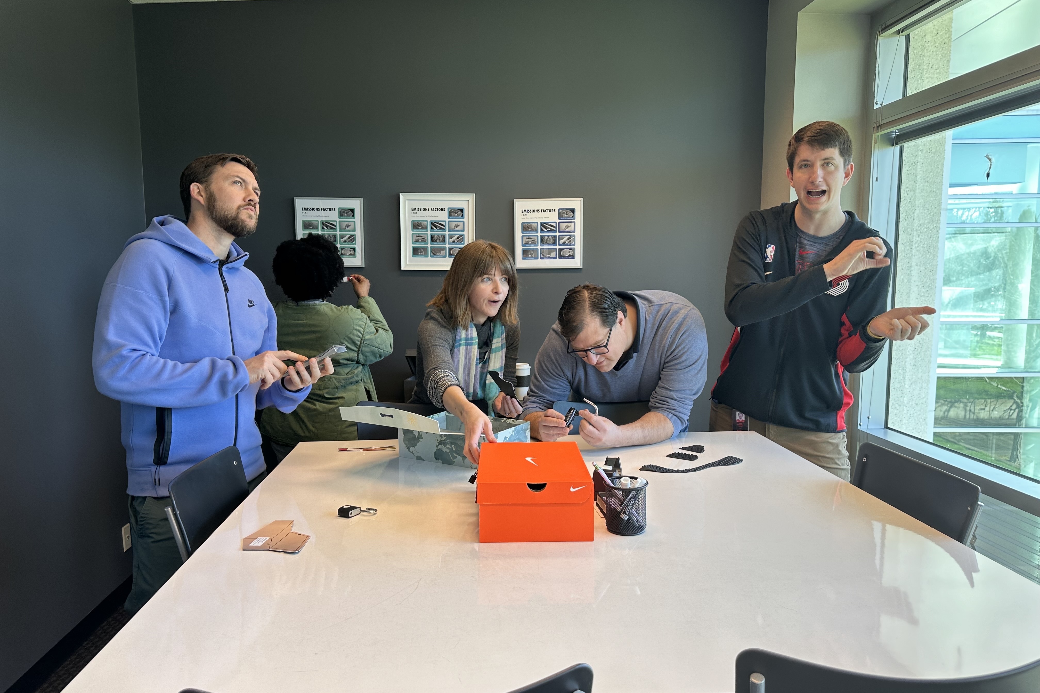 A group of people solving puzzles in an escape room