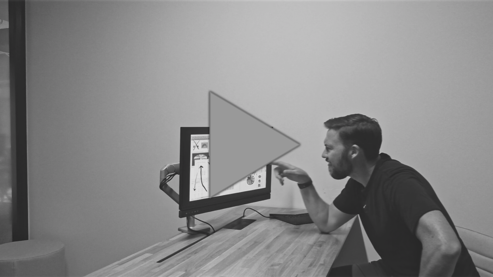 Confused business person sitting at computer